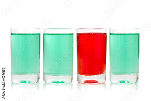 glasses with green and red liquid