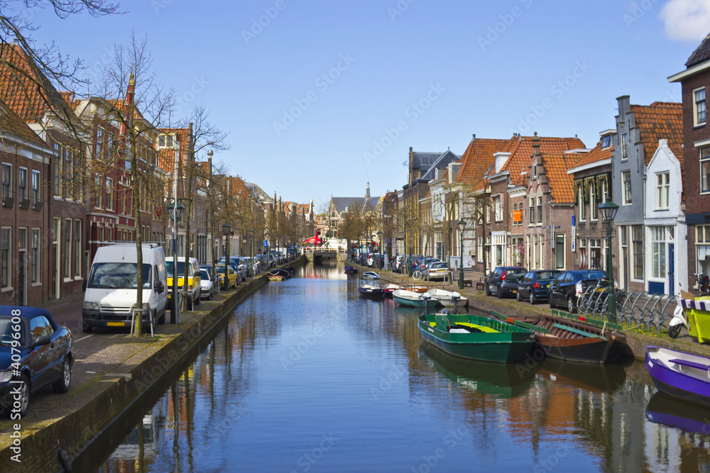Traditional dutch houses on the canal in Alkmaar town, Holland,
