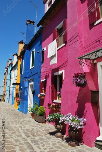 Colorful houses on the canals in Burano Island  Venice  Italy