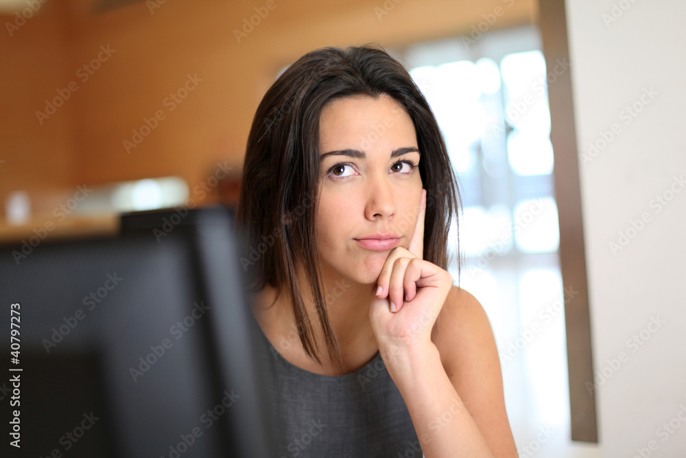 Office worker with interrogative look on her face Office worker with interrogative look on her face