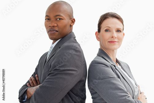 Fényképezés business people with hands crossed looking at camera