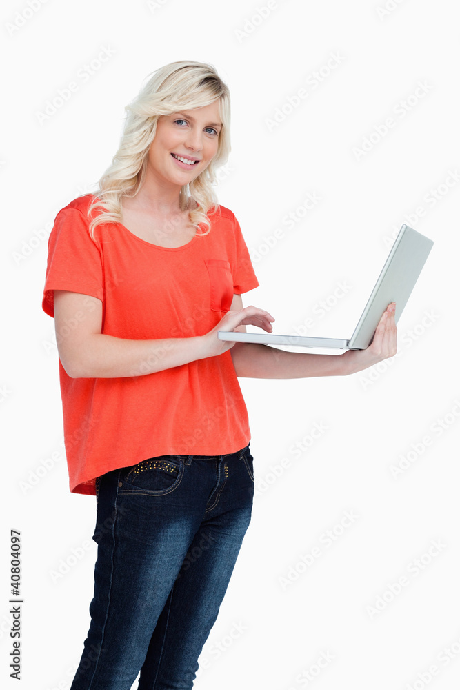 custom made wallpaper toronto digitalSmiling woman looking straight at the camera while holding a lap