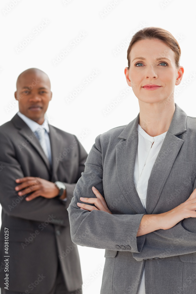 Business people posing with arms crossed Business people posing with arms crossed