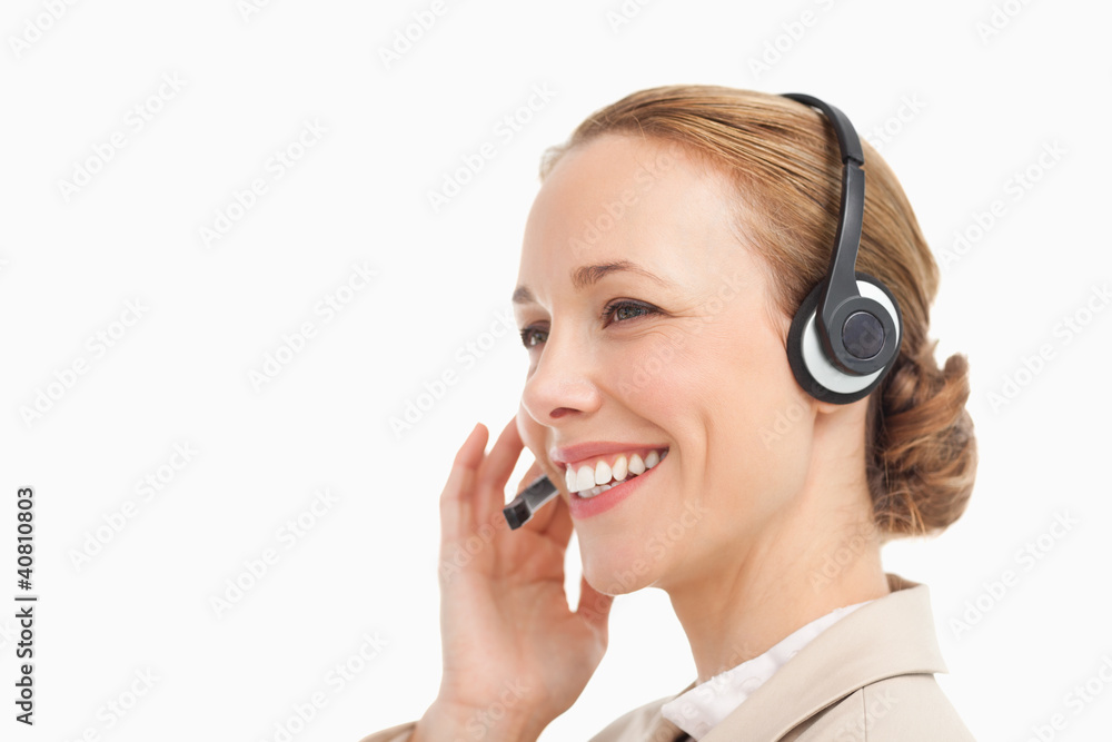 Pretty woman in a suit with headset Pretty woman in a suit with headset