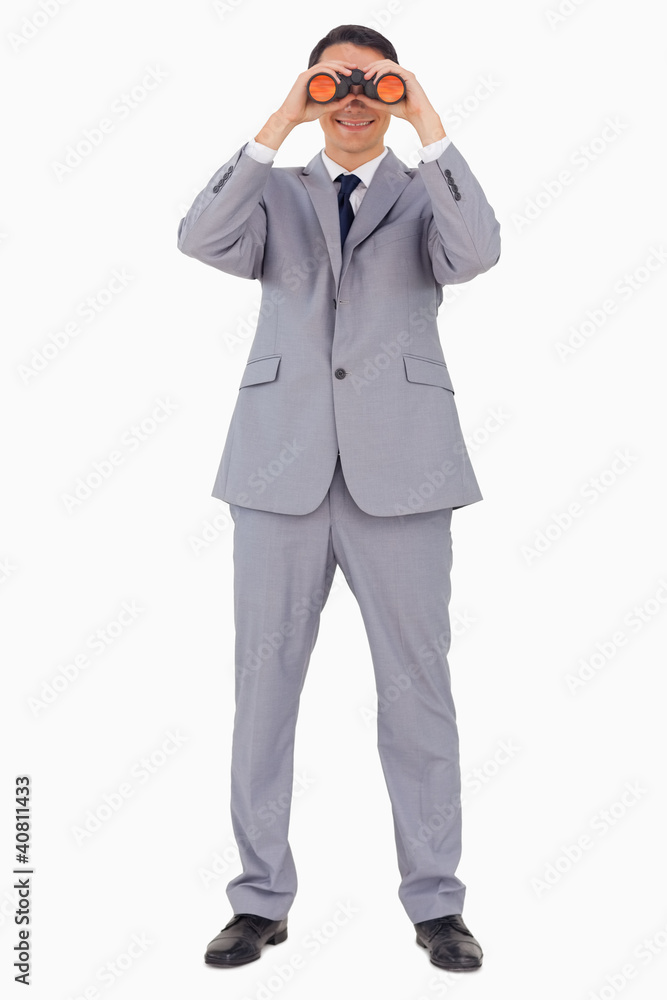 Businessman using binoculars Businessman using binoculars