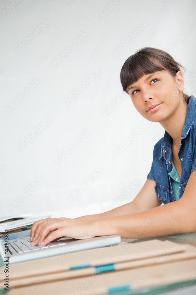 Pretty student doing her homework Pretty student doing her homework