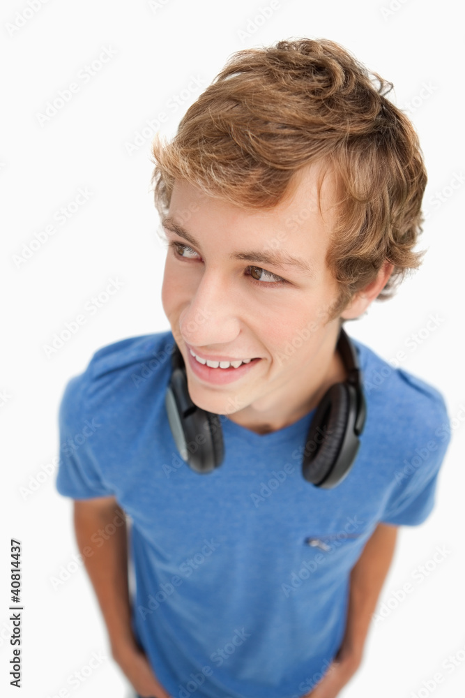 Fisheye view of a blond student with headphones Fisheye view of a blond student with headphones