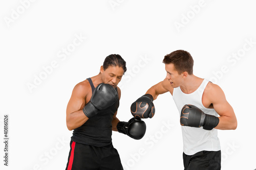 Side view of fighting boxers