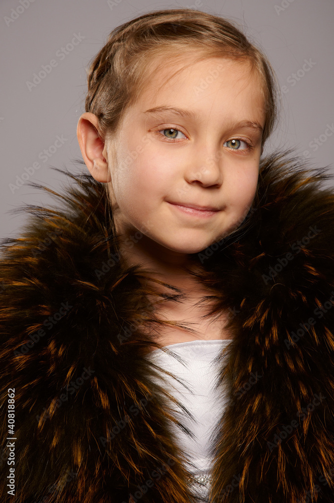 Smiling girl blonde in fur coat Smiling girl blonde in fur coat