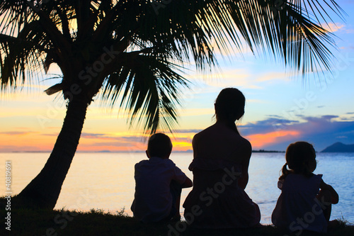 Silhouettes of mother and two kids © BlueOrange Studio
