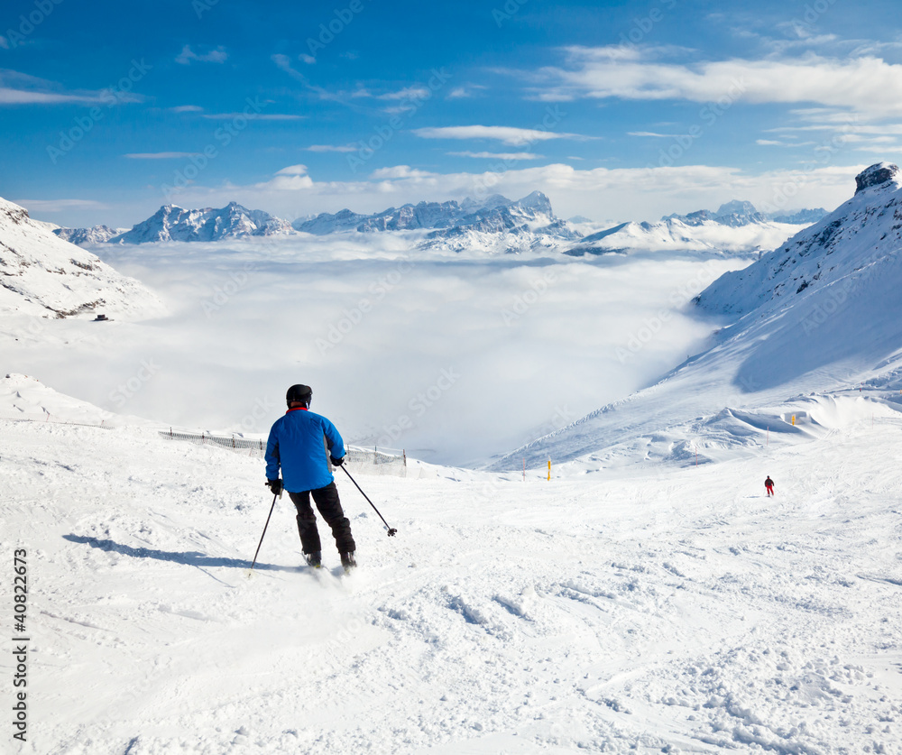 Skier on a piste