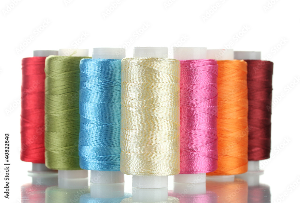 bright bobbin thread isolated on white. bright bobbin thread isolated on white.