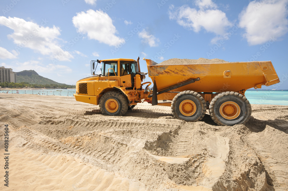 Dump trunk full of sand on a beach Dump trunk full of sand on a beach