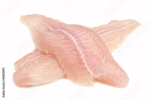 Fillet of Fish Pangasius. Isolated on white background. photo