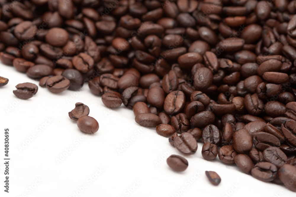 Roasted coffee beans catty-corner isolated Roasted coffee beans catty-corner isolated
