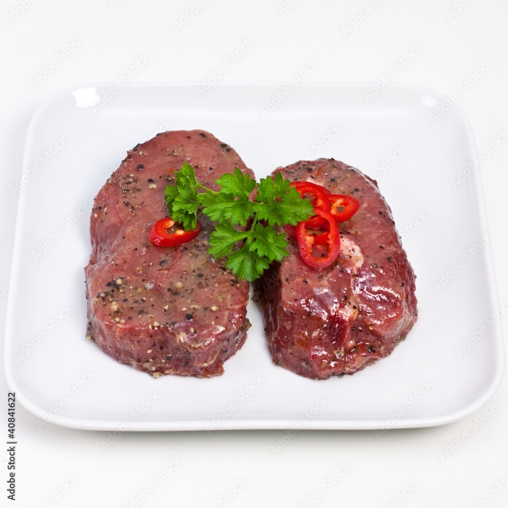 Marinated beef steaks with parsley Marinated beef steaks with parsley
