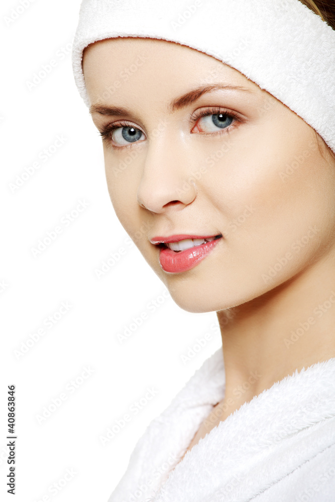 Young beautiful happy woman in bathrobe, isolated on white Young beautiful happy woman in bathrobe, isolated on white