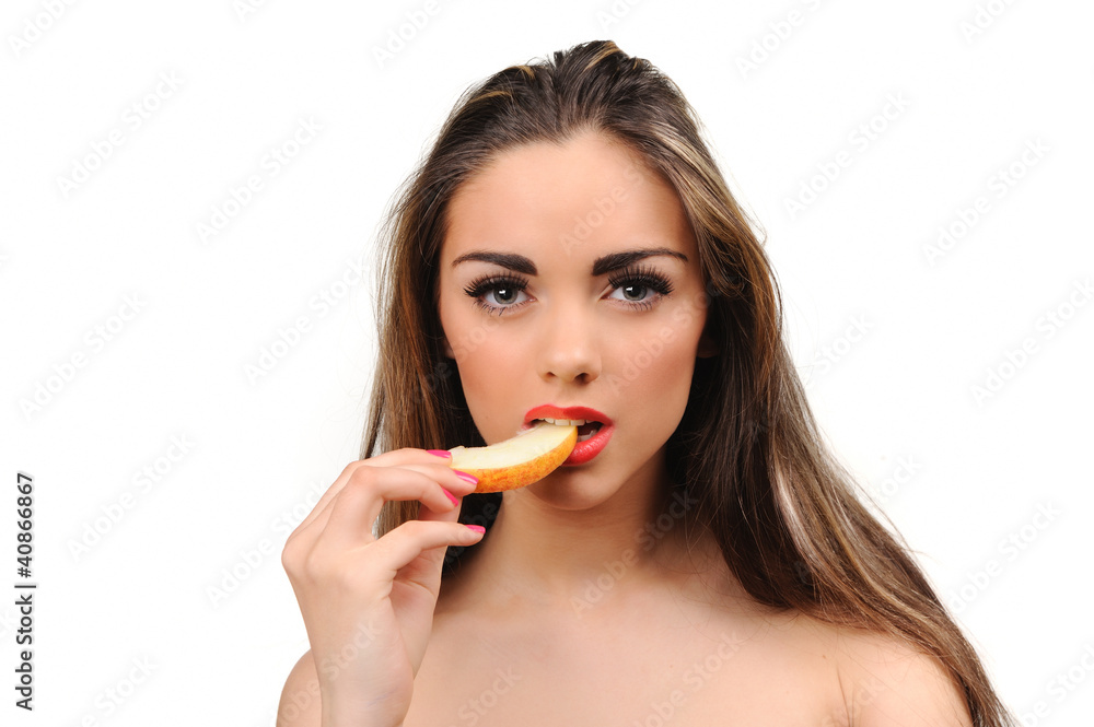 Beautiful young woman eating an apple. Isolated over white Beautiful young woman eating an apple. Isolated over white