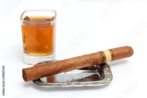 Big cigar and whiskey cup