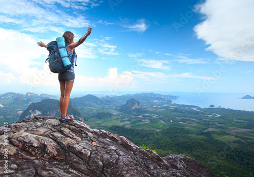 Backpacker on a rock