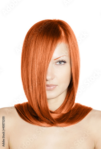 woman with long healthy shiny red hair