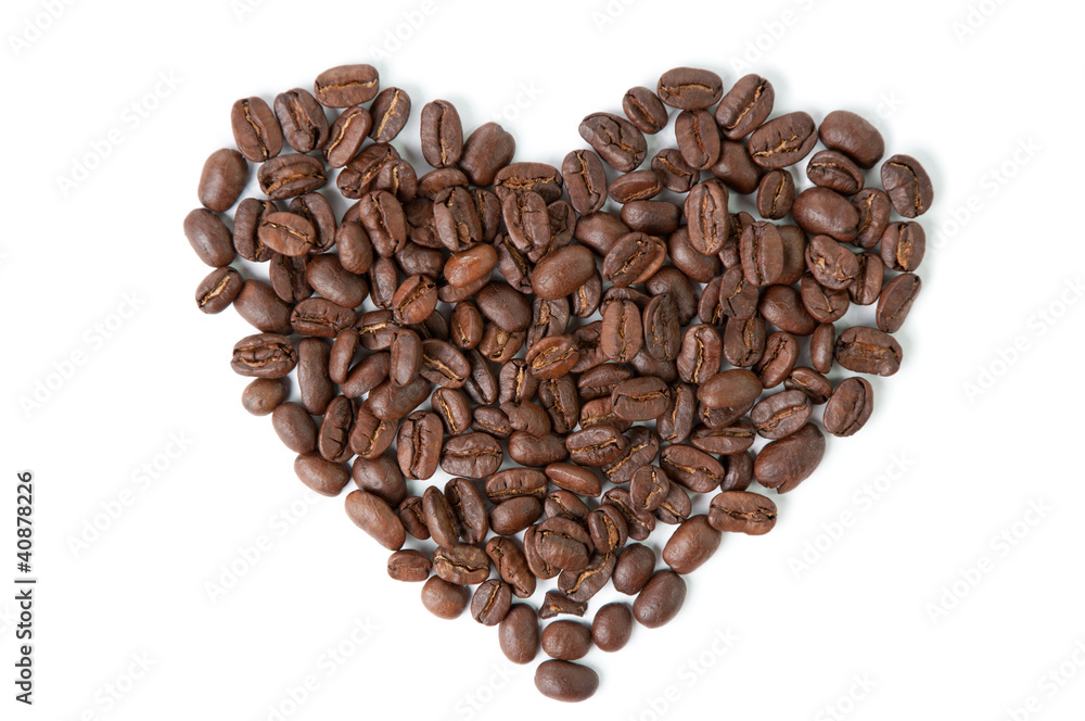 Big coffee heart made of grains, isolated on white Big coffee heart made of grains, isolated on white
