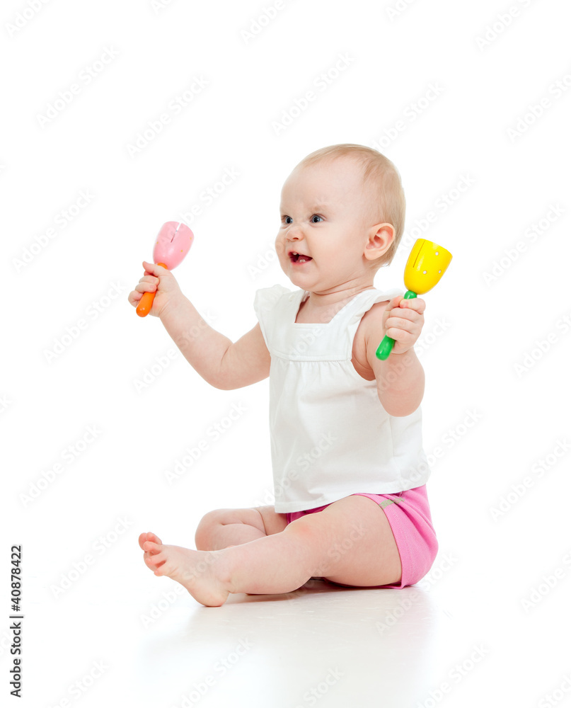 funny baby girl playing with musical toy funny baby girl playing with musical toy