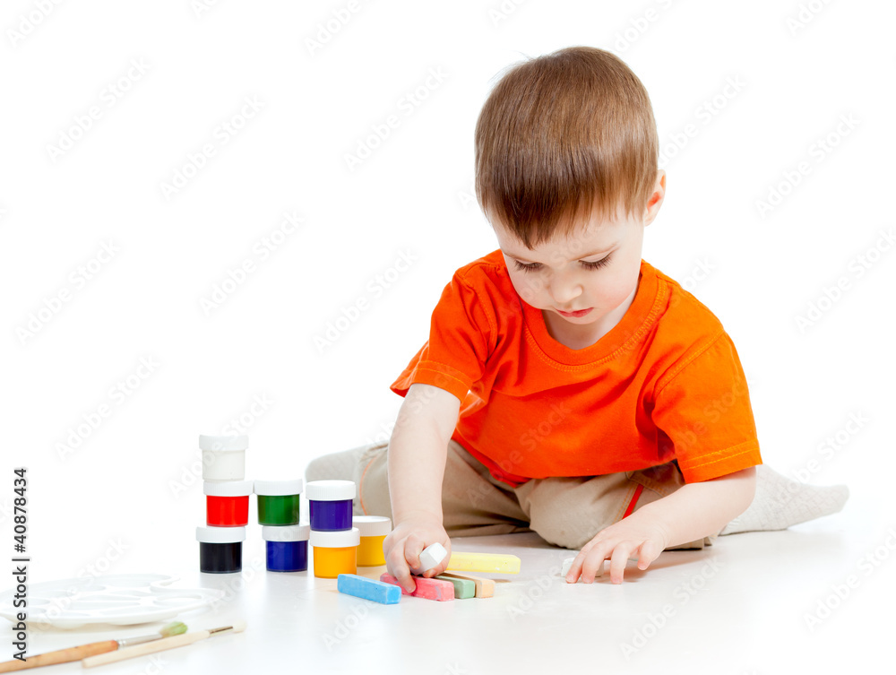 cute child with paints and chalks cute child with paints and chalks