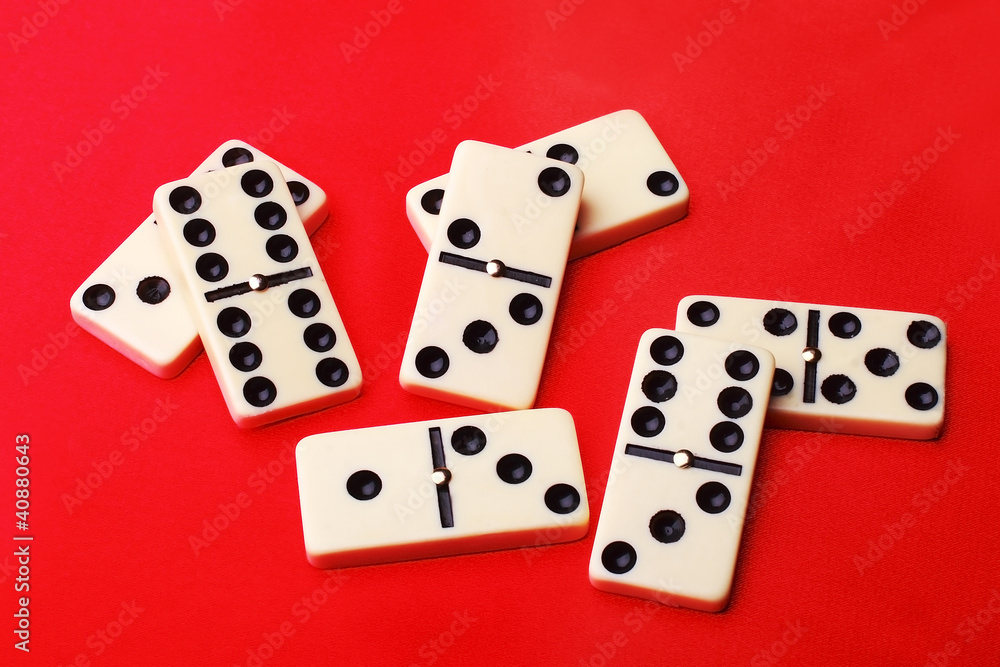 few domino on red background few domino on red background