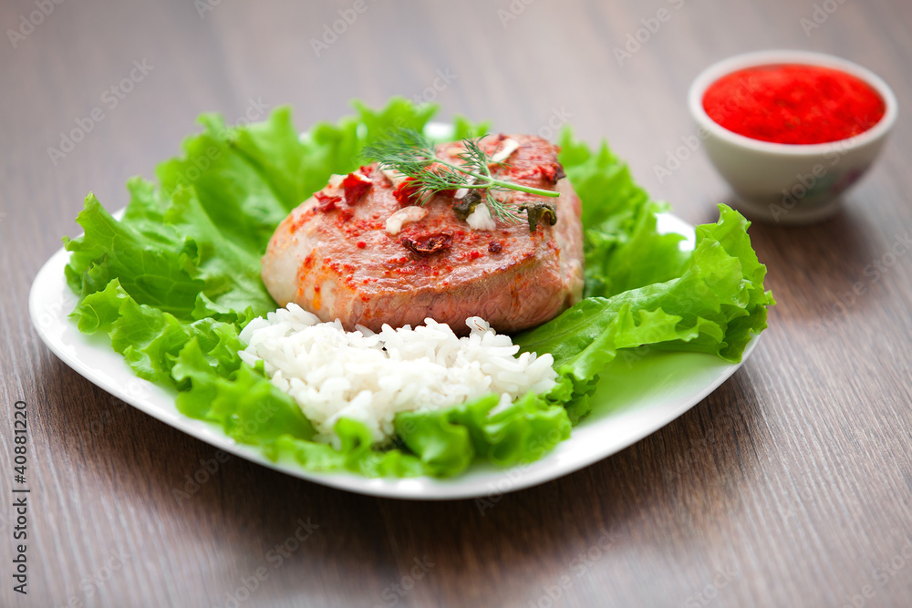 fried meat with rice and vegetables fried meat with rice and vegetables