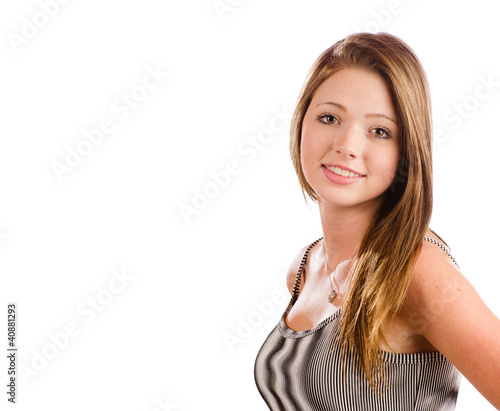 Portrait of beautiful teenage girl smiling isolated on white