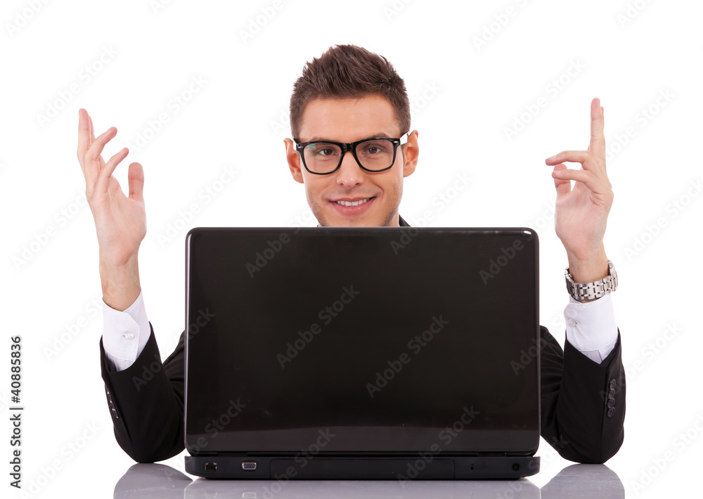 businessman at his desk with a laptop businessman at his desk with a laptop