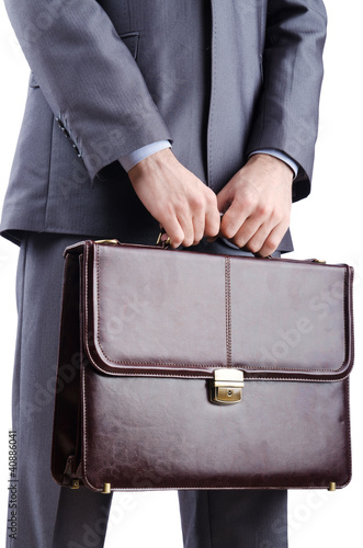 Businessman with briefcase on white