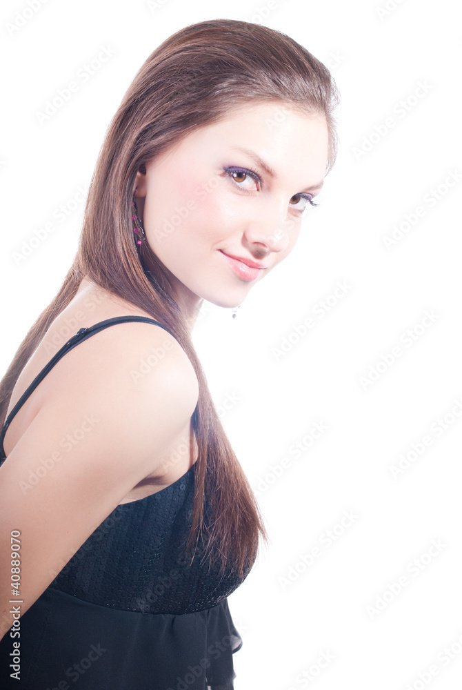 Young beautiful woman looking over shoulder Young beautiful woman looking over shoulder