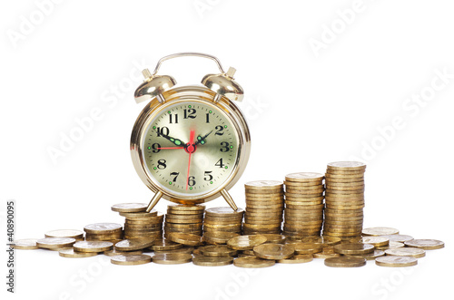 Alarm clock and money isolated on white background