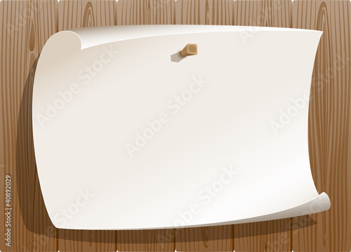 Paper pinned on wood background