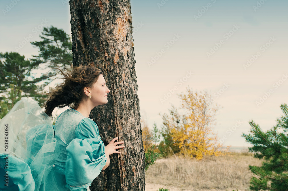 girl in medieval dress. strong wind girl in medieval dress. strong wind