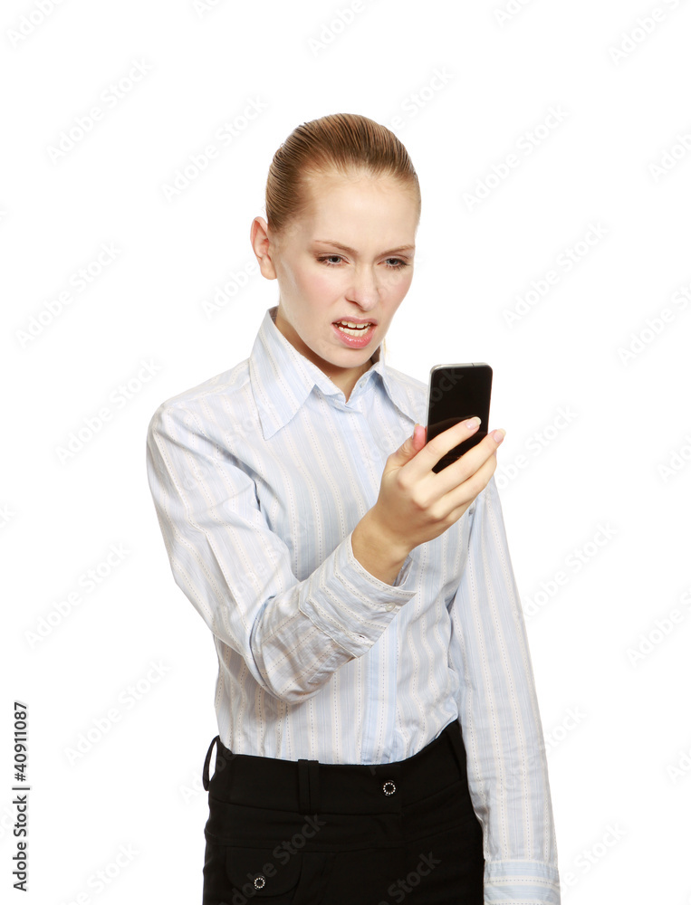 A smiling businesswoman is talking on mobile phone A smiling businesswoman is talking on mobile phone