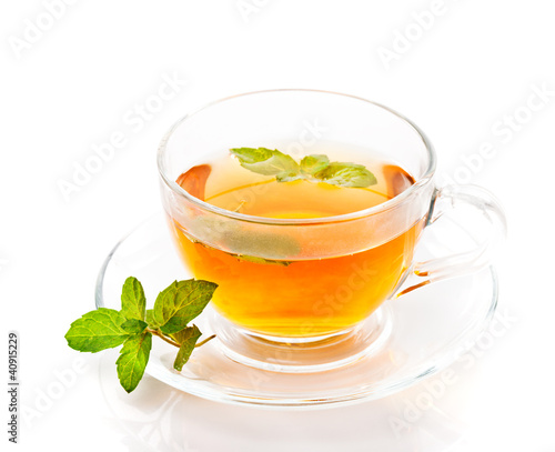 Tea cup with mint isolated