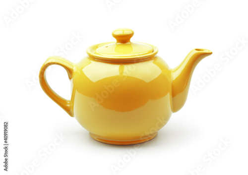 Bright orange teapot isolated on white background