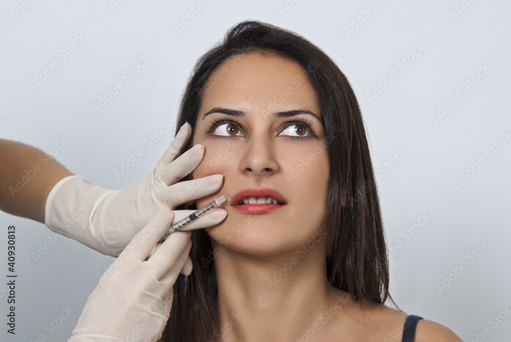 Cosmetic botox injection in the female face Cosmetic botox injection in the female face