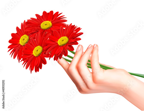 Red flowers in a hand. Vector.