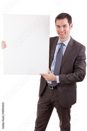 Young caucasian businessman holding a white board