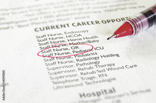 closeup of newspaper classified section - healthcare field
