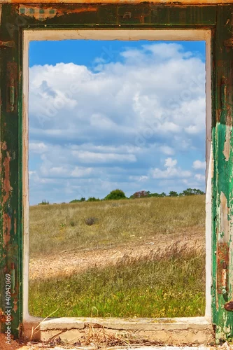 Fototapeta Zobacz krajobraz ze starego okna.