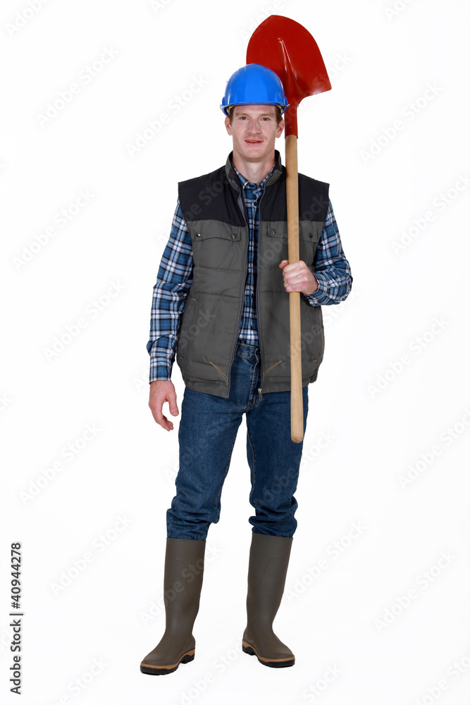 Construction worker with a shovel