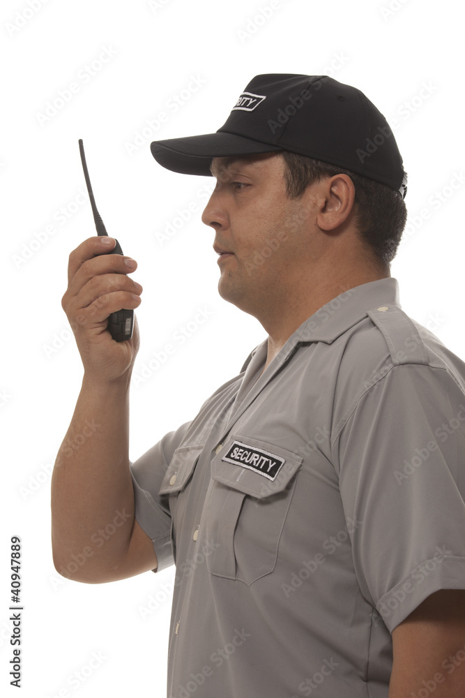 Security guard hand holding cb walkie-talkie radio Security guard hand holding cb walkie-talkie radio