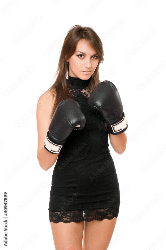 Pretty brunette woman in boxing gloves
