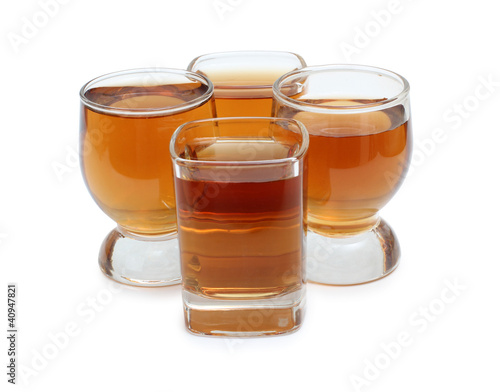 Whiskey in glasses cups
