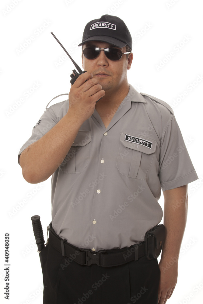 Security guard hand holding cb walkie-talkie radio Security guard hand holding cb walkie-talkie radio